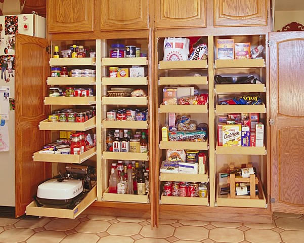Pantry & laundry room closet organizers with custom shelving in Boston MA.